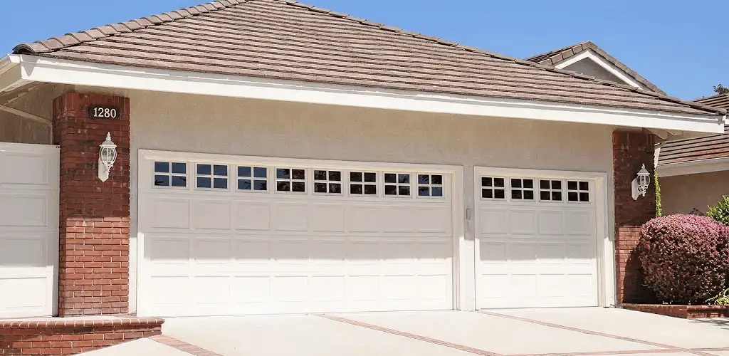 Residential garage door repair service for a double garage door in Boise, ID