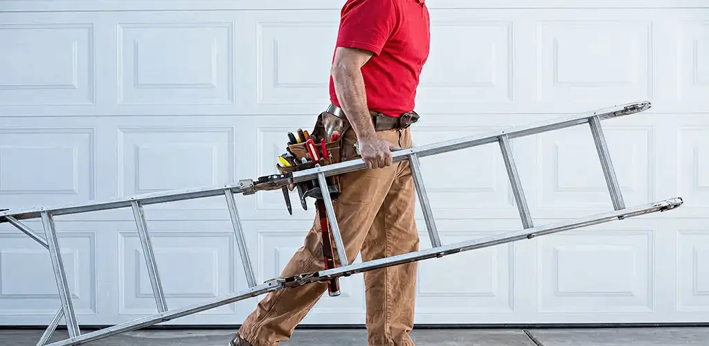 Garage door repair technician arriving with tools and ladder in Boise, ID