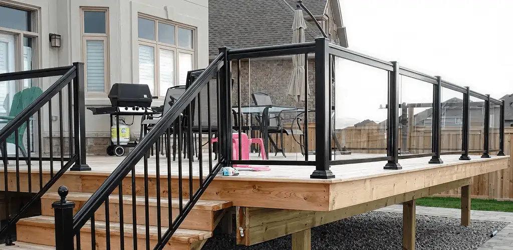 Handrail installation on a deck staircase for safety and code compliance in Boise, ID