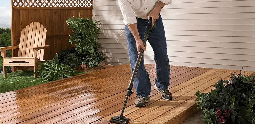 Deck staining service applying stain to a backyard wood deck in Boise, ID